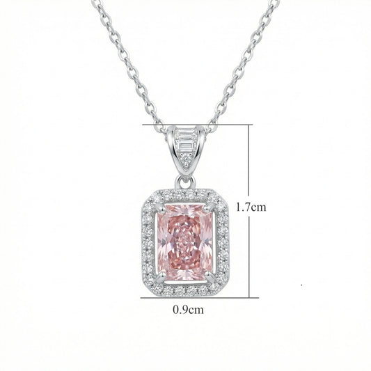 The Sakura Hanagasumi Pendant, front view, radiant-cut pink gemstone in a halo setting