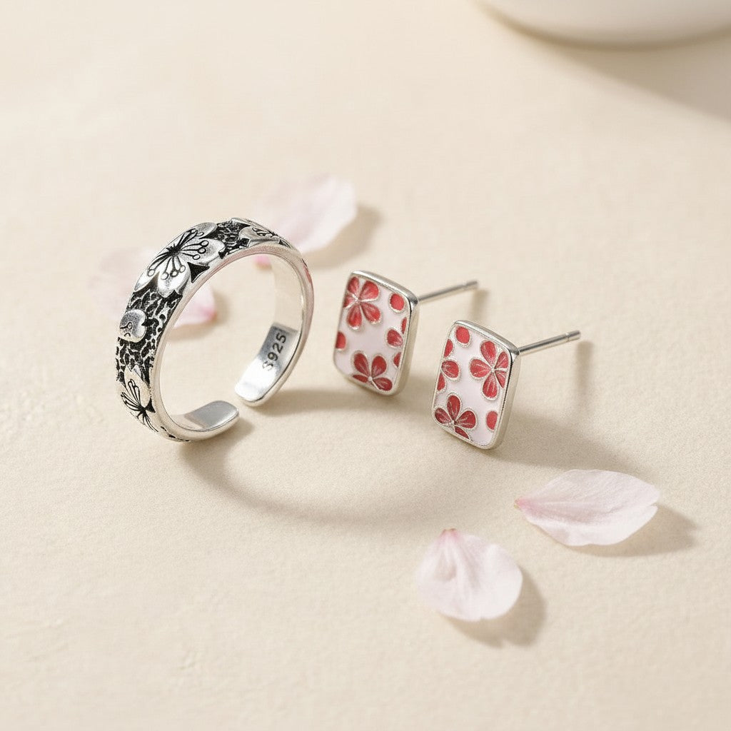 The Hanami Set — close-up of the cherry blossom ring and stud earrings together