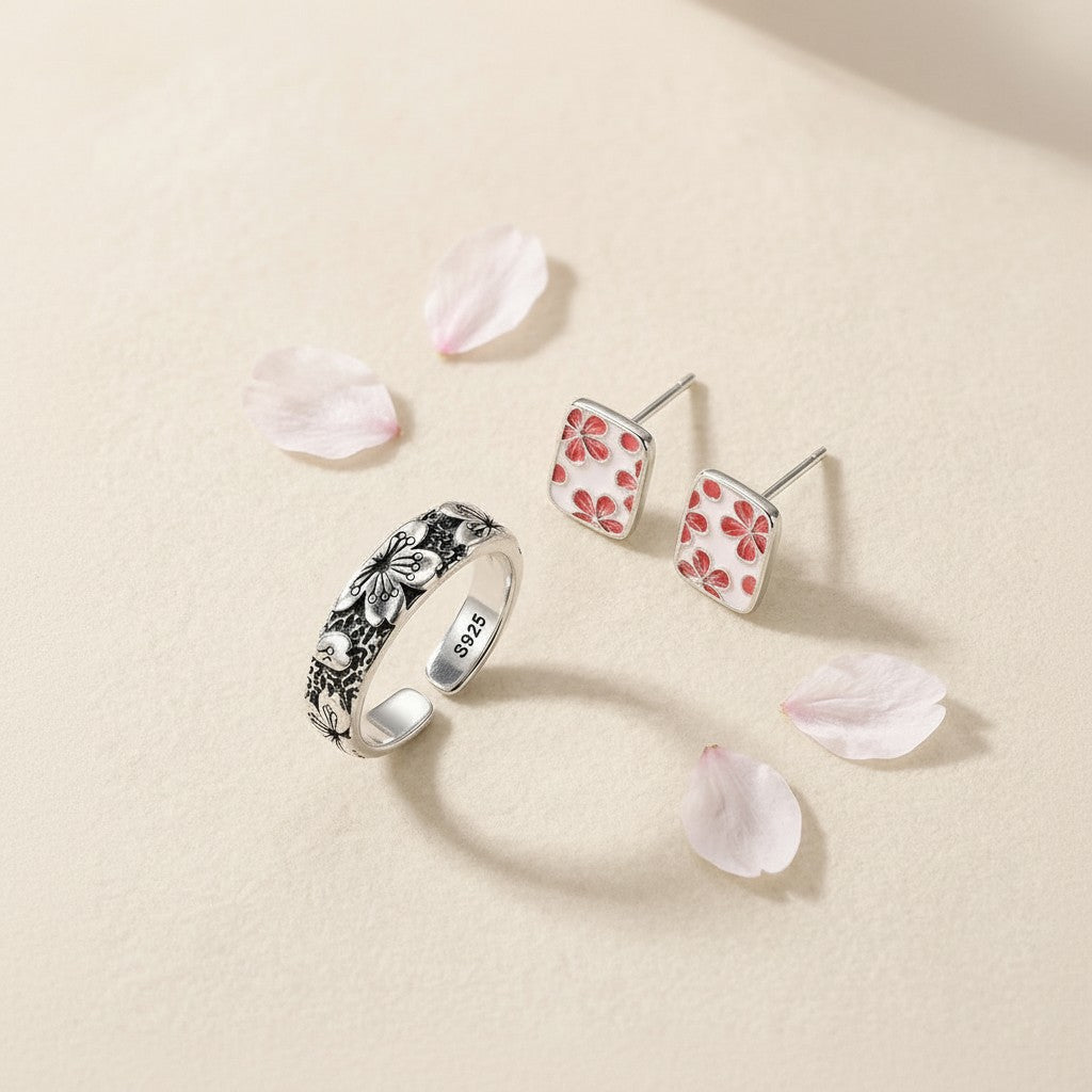 The Hanami Set — three-quarter angle of Sakura Ring Komorebi and The Sakura Essence Studs